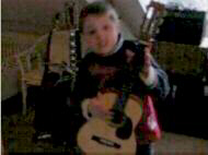 Damian op de gitaar | Video: F. de Meijer